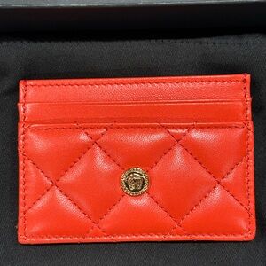 Orange Quilted Leather Card Case with Gold Medallion